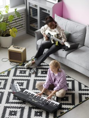 full-shot-women-playing-instruments